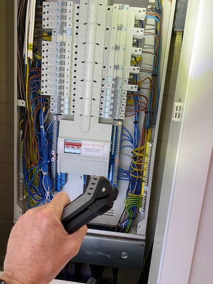 Front lamp illuminating an electrical distribution board